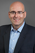 Headshot of Steven Del Duca.