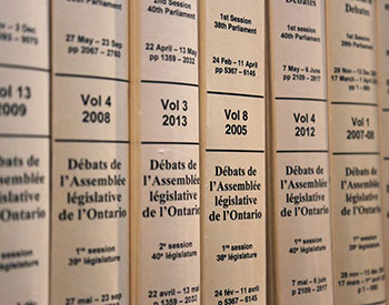 several bound volumes of Hansard