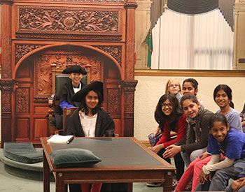 group of children in a mock legislative Chamber