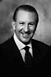 A headshot of Ernie Eves