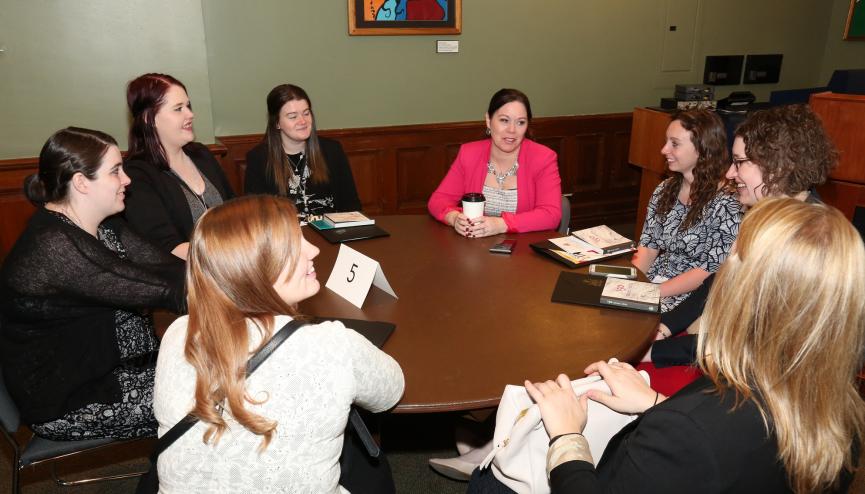 Women attending an activity during the women's forum.