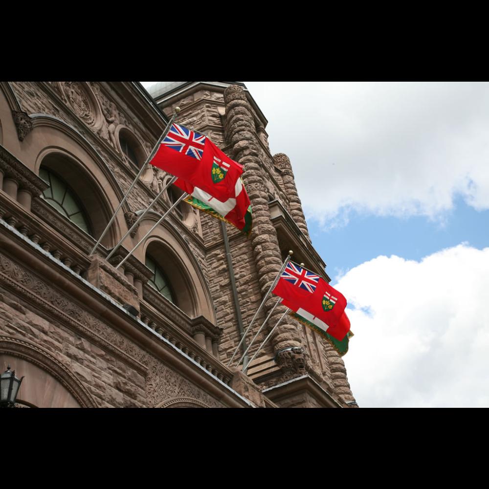 Ontario flag above the centre block of the Legislative Building, south side.