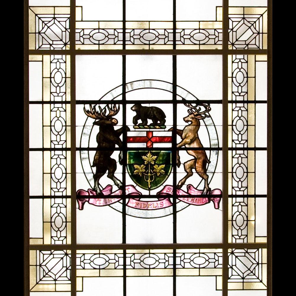 The West wing stained glass ceiling depicting the province of Ontario's coat of arms. 