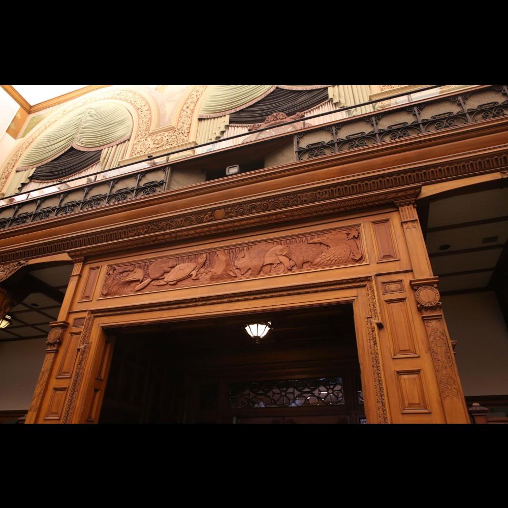 Seven Grandfather carving above door